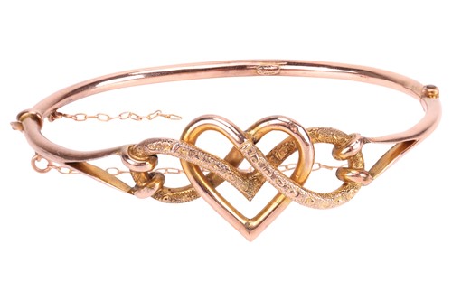 Lot 31 - A late 19th Century hinged bangle, the...