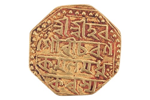Lot 273 - An octagonal Mohur coin, 11.2 grams.