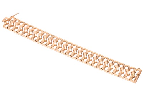 Lot An 18ct gold bracelet, consisting of wide...