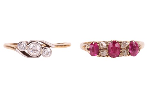Lot 22 - An 18ct ruby and diamond set ring, featuring...