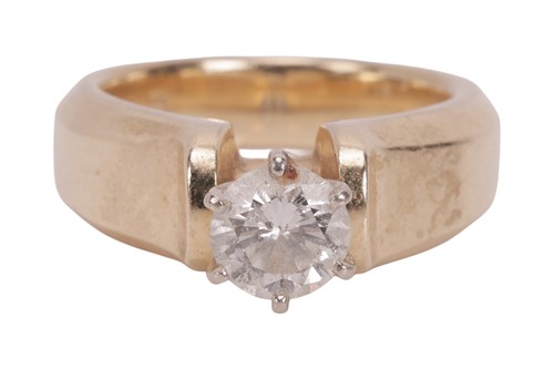 Lot 149 - A diamond solitaire ring, featuring a central...
