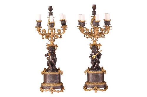 Lot A pair of French Louis XVI-style patinated...