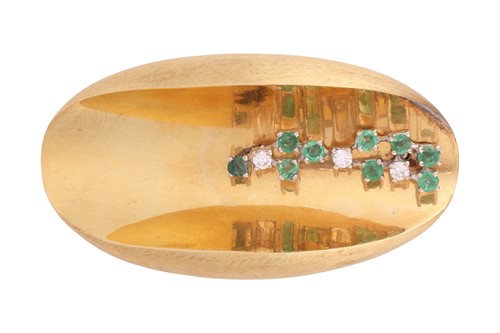 Lot An emerald and diamond brooch, in the style of...
