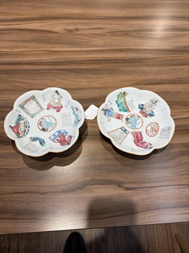 Lot 30 - A pair of famille rose 'Wu Shuang Pu'...