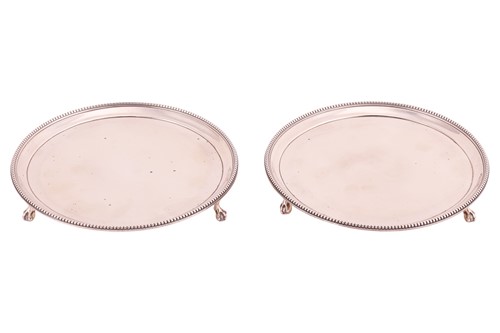 Lot 262 - A pair of George III silver salvers by John...