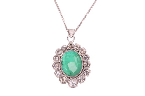 Lot An emerald and diamond pendant, in a cluster...