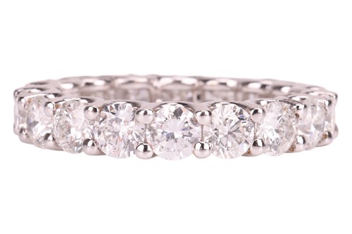 Lot A diamond eternity ring, composed of 18...