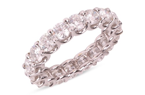 Lot A diamond eternity ring, composed of 18...