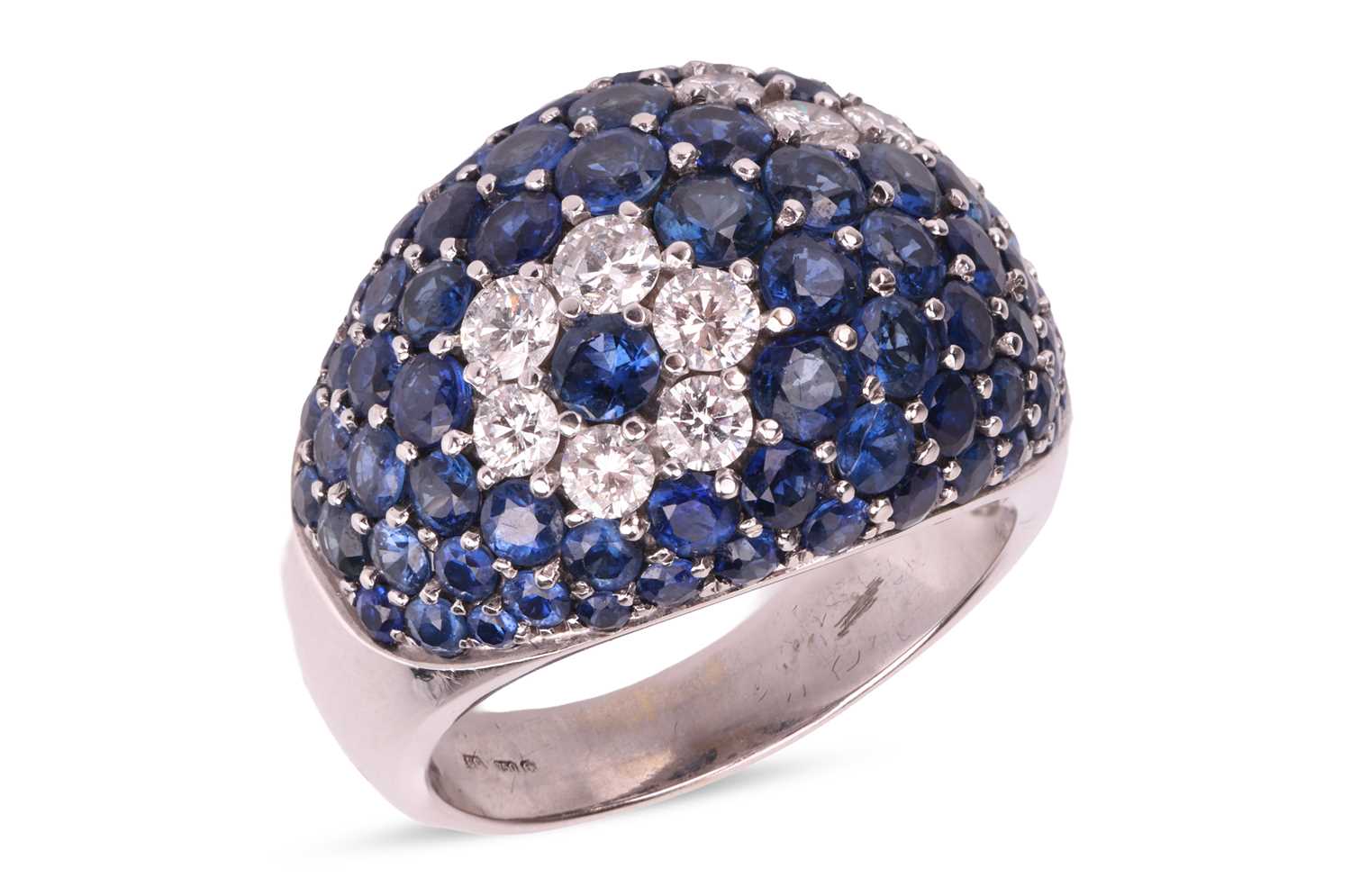 Lot A sapphire and diamond dress ring, of bombe...