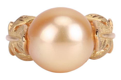 Lot 176 - A cultured pearl and diamond dress ring, the...