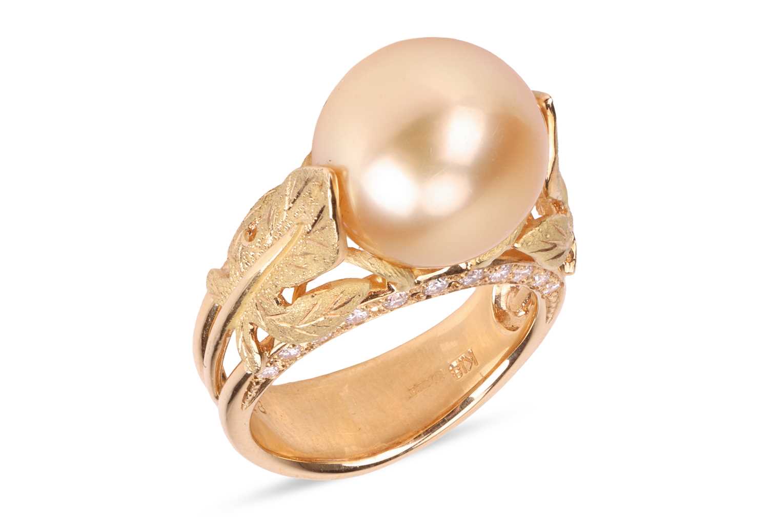 Lot 176 - A cultured pearl and diamond dress ring, the...
