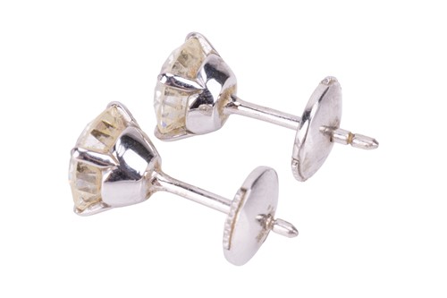 Lot 196 - A pair of diamond stud earrings, each...