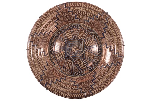 Lot 46 - A large Hispano-Moresque style ceramic charger,...