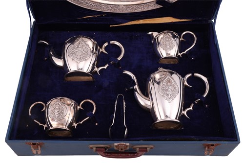 Lot 368 - A cased Thai ‘sterling silver’ four-piece tea...