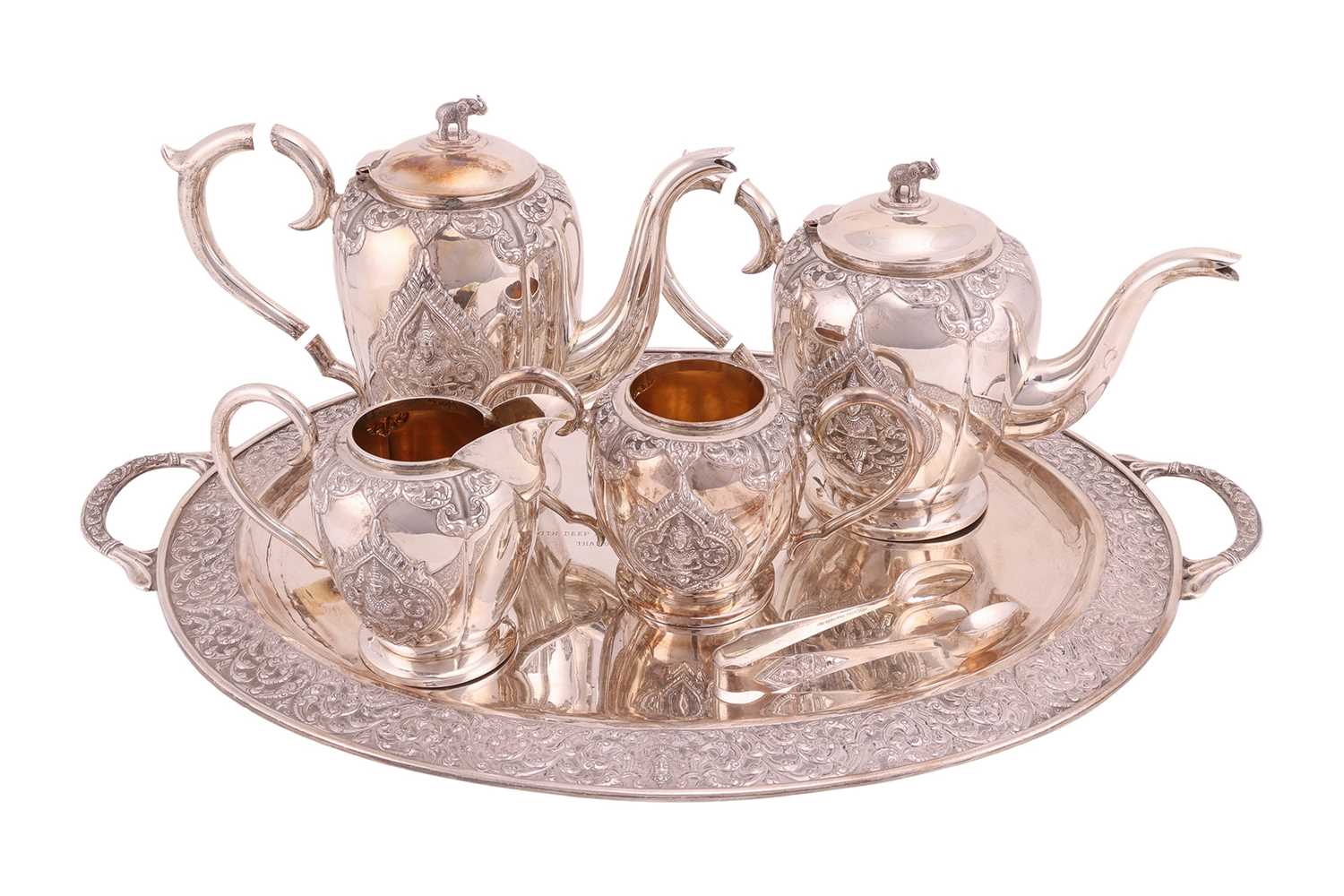 Lot 368 - A cased Thai ‘sterling silver’ four-piece tea...
