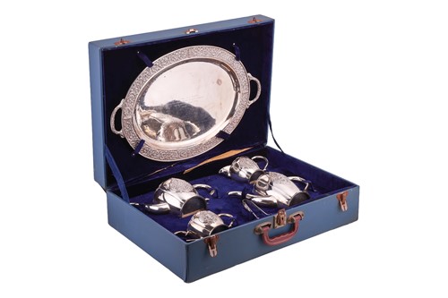 Lot 368 - A cased Thai ‘sterling silver’ four-piece tea...