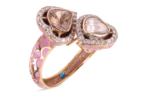 Lot 85 - A diamond and enamel crossover ring, each...
