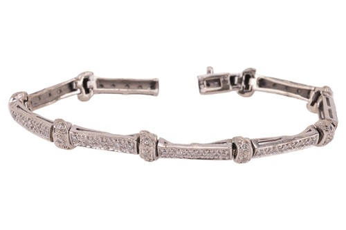 Lot 43 - A diamond-set bracelet, featuring rectangular...