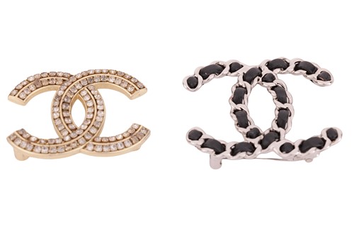 Lot 12 - Two Chanel CC brooches, the first set with two...