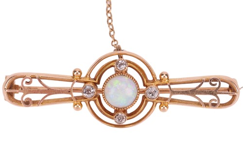 Lot 33 - An opal and diamond brooch, of openwork design,...