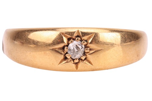Lot 1 - A diamond single-stone ring, gypsy-set with a...