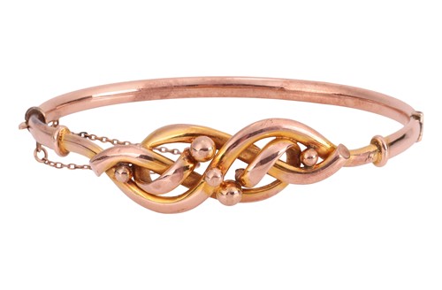 Lot 37 - An early 20th Century bangle, of interwoven...