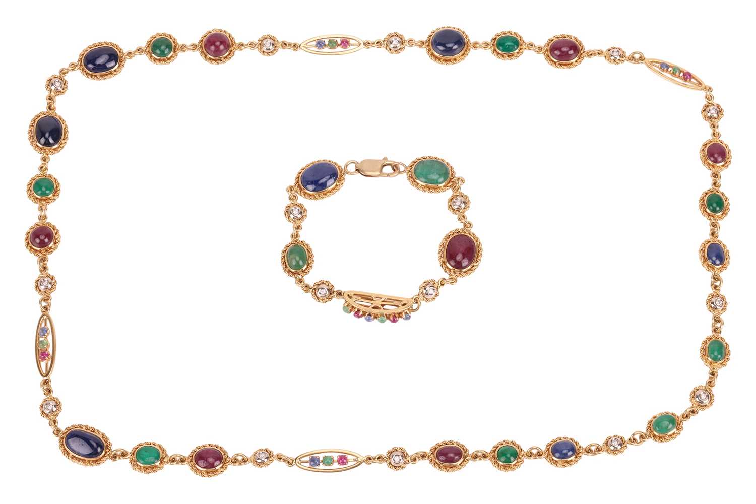 Lot A gem-set long necklace and matching bracelet,...