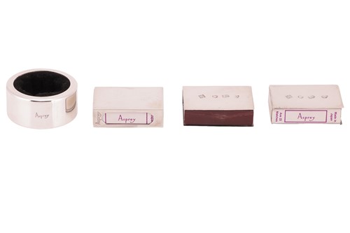 Lot 289 - Asprey - A silver matchbox cover and a white...