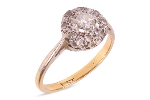 Lot 10 - A diamond cluster ring, featuring an old cut...