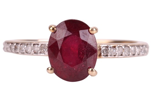 Lot 53 - A ruby and diamond ring, with an oval faceted...