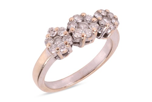 Lot 138 - A diamond cluster ring, comprising three...