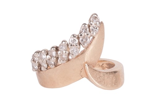 Lot 83 - A diamond-set dress ring, featuring a band of...