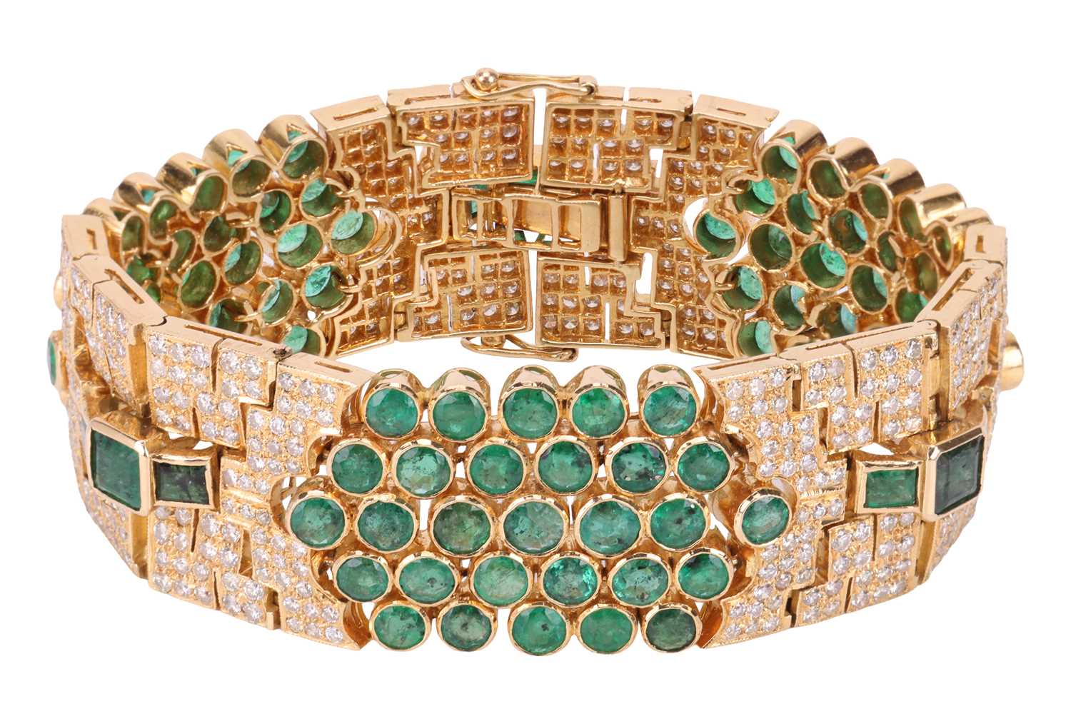 Lot 200 - An emerald and diamond bracelet, comprising...