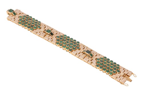 Lot 200 - An emerald and diamond bracelet, comprising...