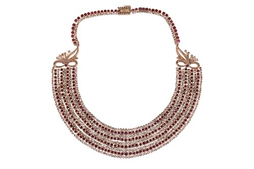 Lot 201 - A ruby and diamond collar necklace, comprising...