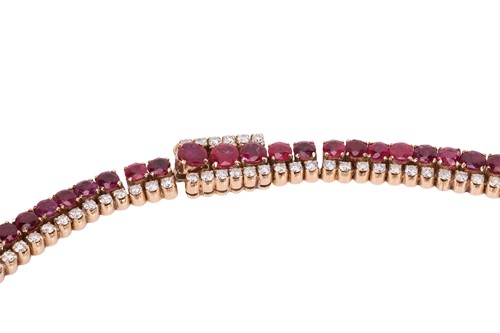 Lot 201 - A ruby and diamond collar necklace, comprising...