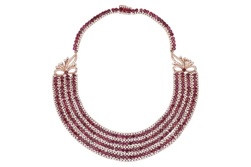 Lot 201 - A ruby and diamond collar necklace, comprising...