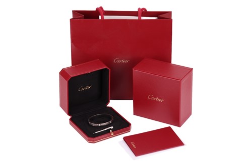 Lot Cartier - A 'LOVE' bangle in 18ct white gold...