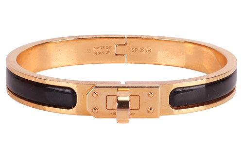 Lot 32 - Hermès - A Mini Clic Kelly bangle, the hinged...