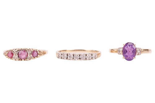 Lot 50 - Three gem-set rings; The first a ruby and...