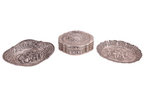 Lot 312 - Two Continental trinket dishes, the first...