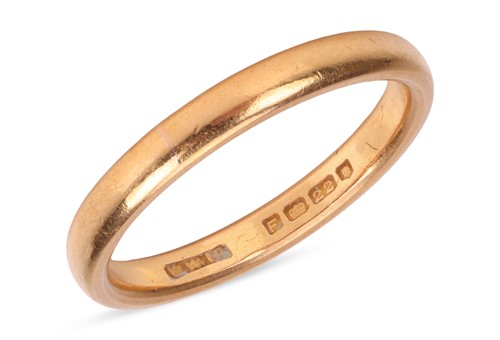 Lot 98 - A 22ct gold band ring, the band measuring...