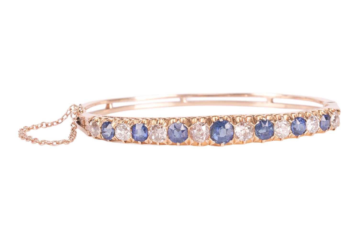 Lot 43 - An old-cut diamond and sapphire hinged bangle,...
