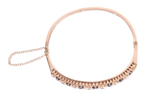 Lot 43 - An old-cut diamond and sapphire hinged bangle,...
