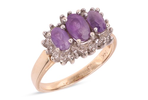 Lot 131 - An amethyst and diamond cluster ring,...