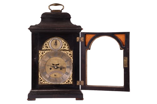 Lot 74 - A George III ebonised bracket clock, the brass...