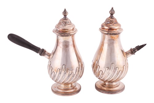 Lot 214 - A pair of silver-plated chocolate pots, of...