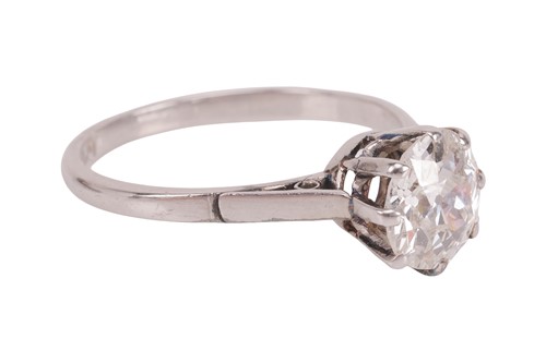 Lot 55 - An old-cut diamond solitaire ring, with an...