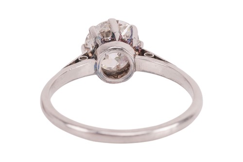 Lot 55 - An old-cut diamond solitaire ring, with an...