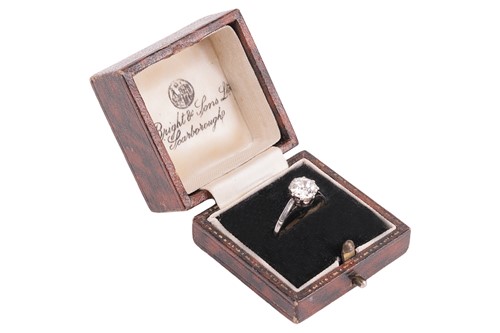 Lot 55 - An old-cut diamond solitaire ring, with an...